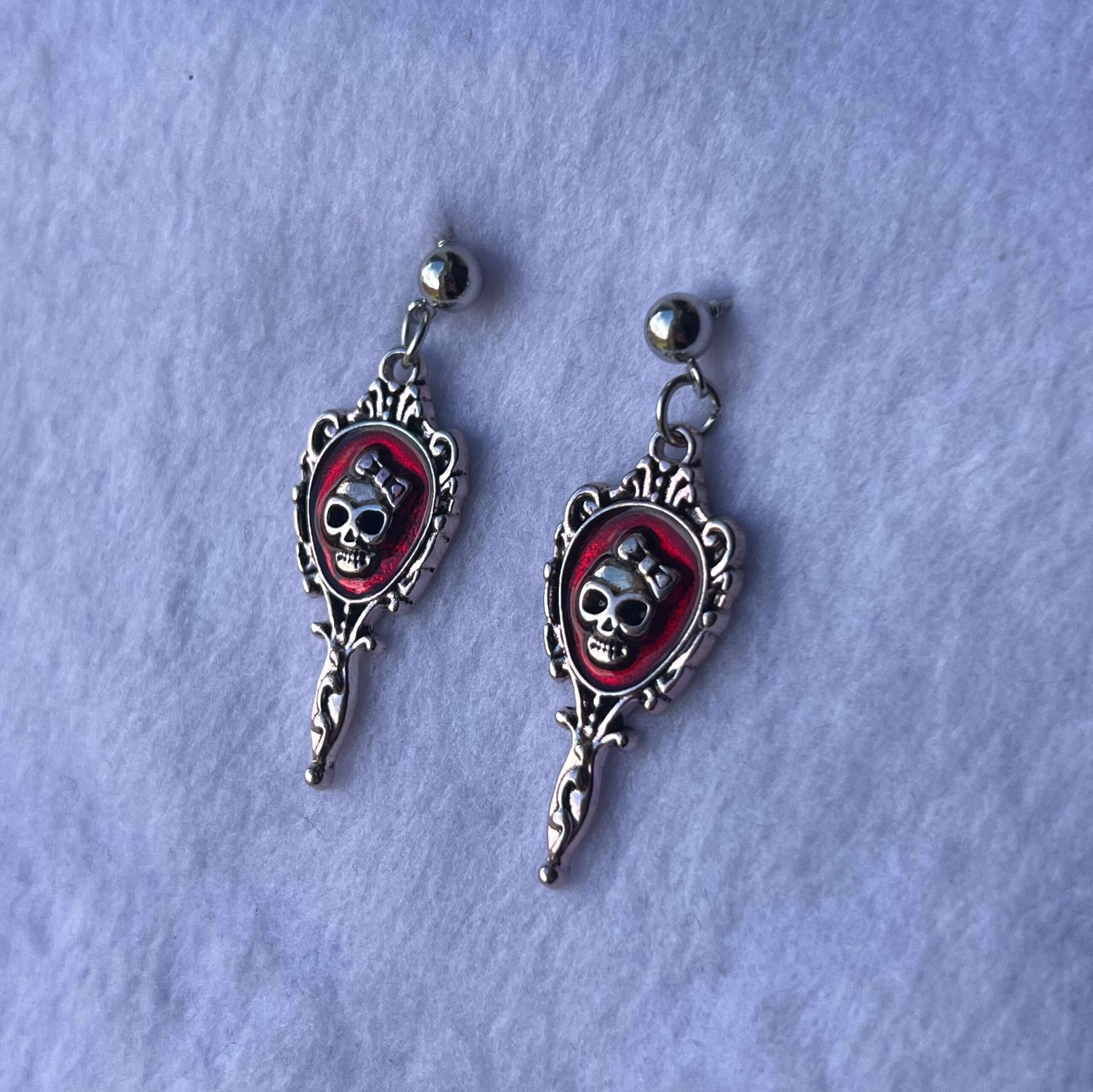Aretes largos Espejos rojos