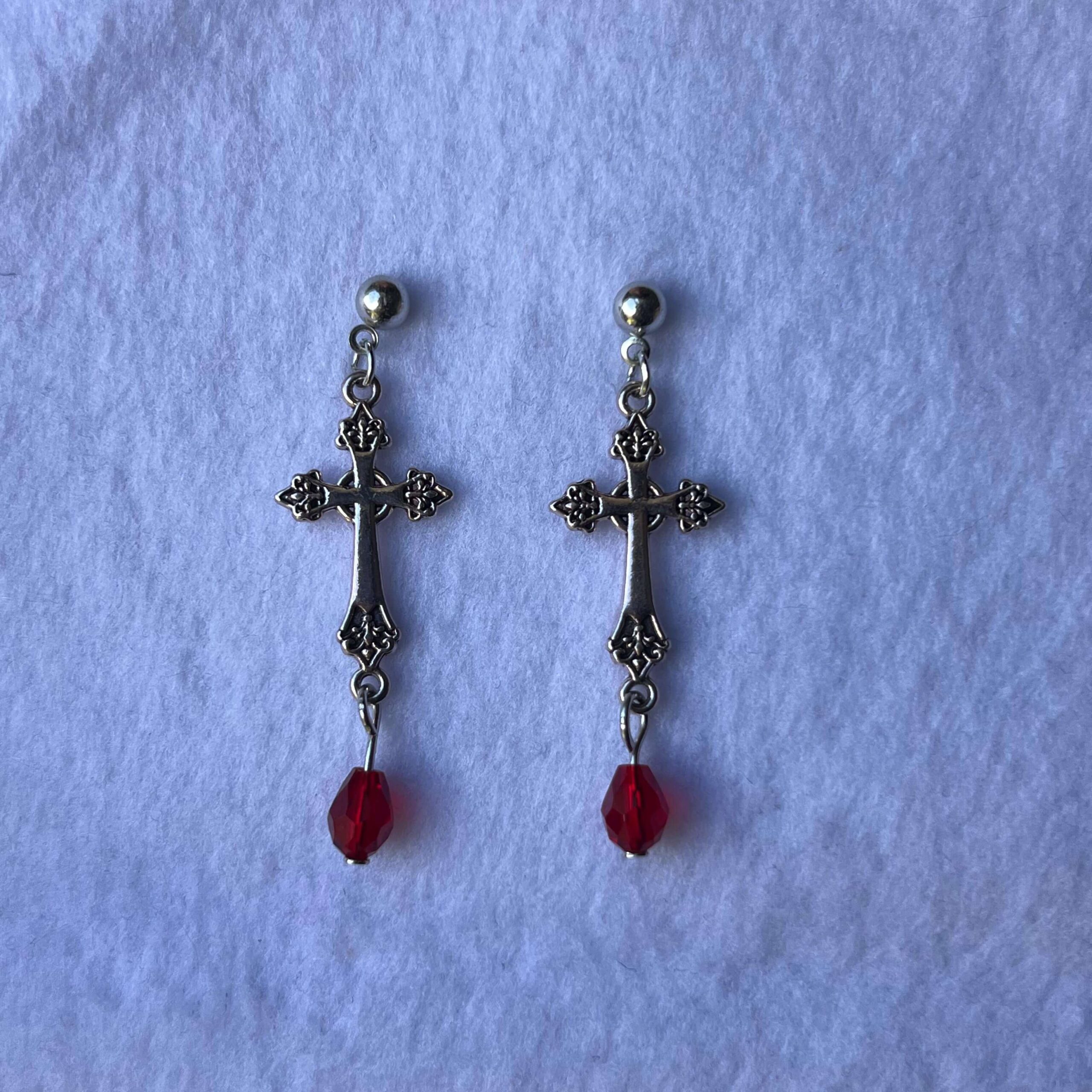 Aretes largos de cruz